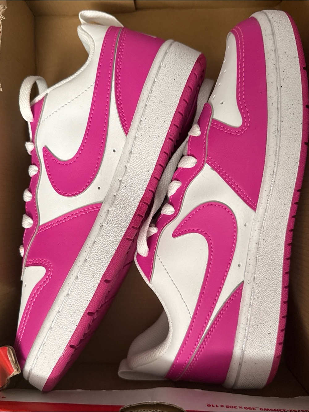 Nike Women's Low-Top  in White and Hot Pink